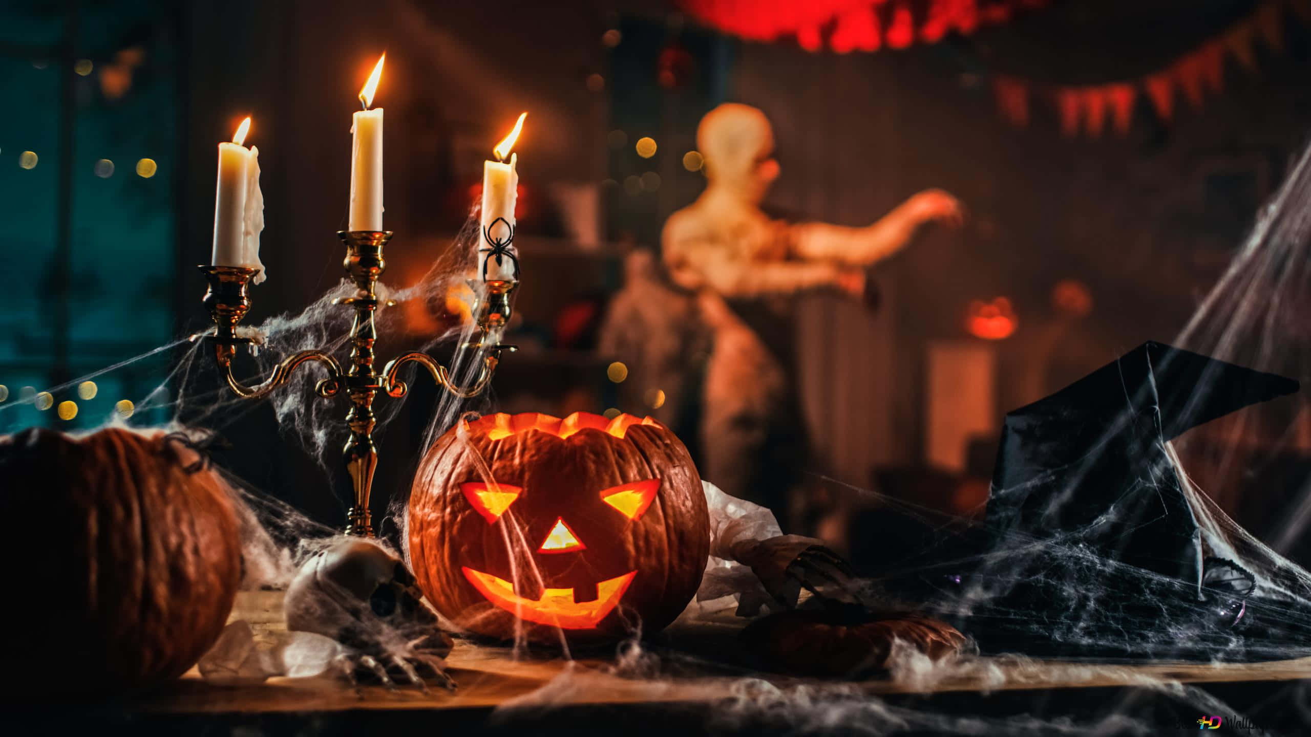 Illuminate your home for Halloween with festive candles Wallpaper