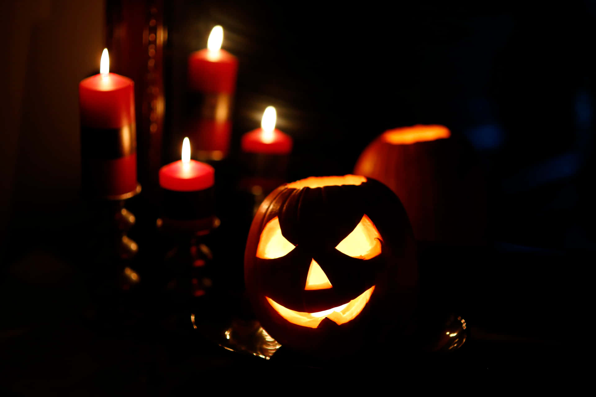 "Light up your Halloween Night with Wickedly Fun Candles" Wallpaper