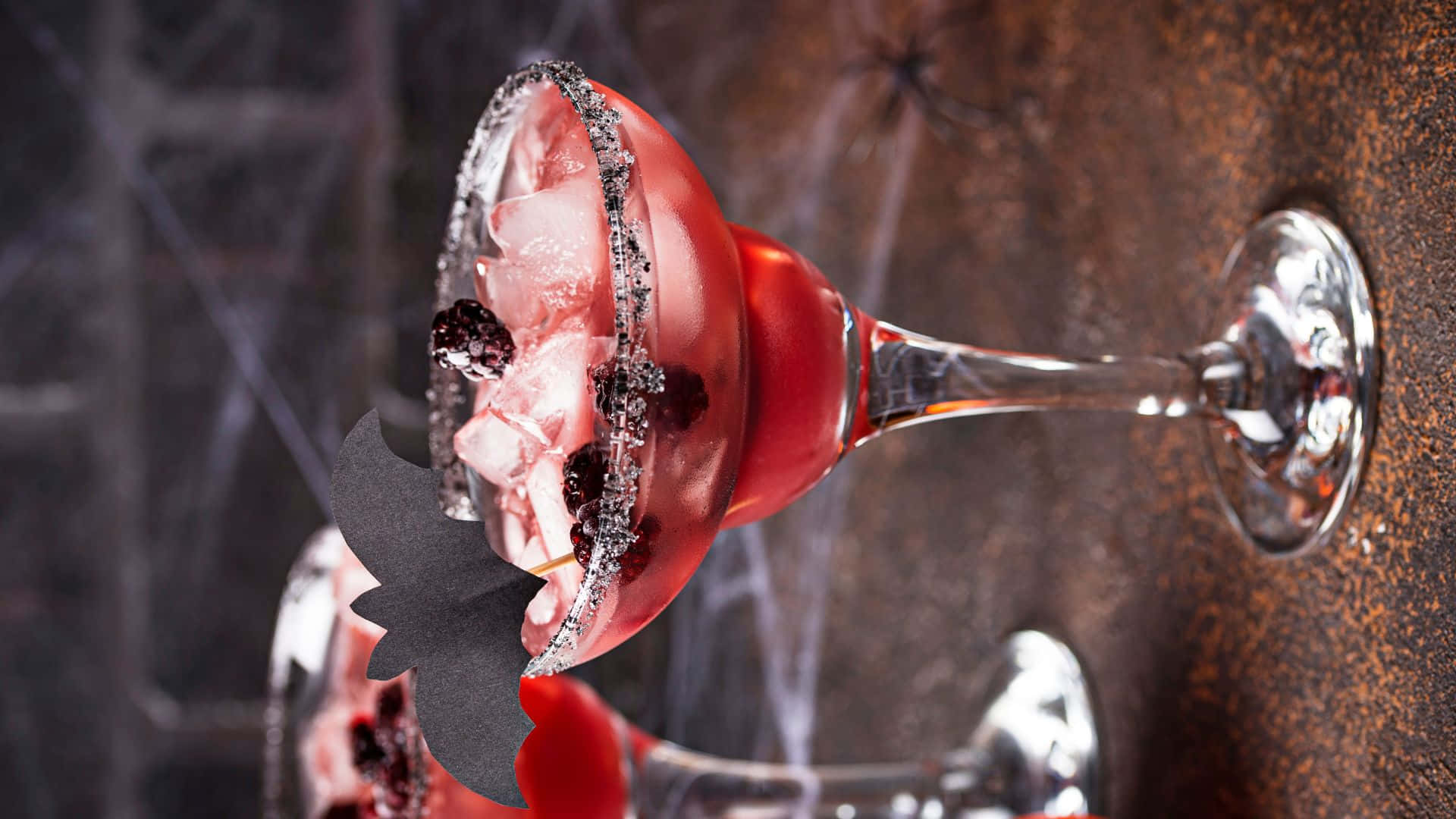 Get into the spirit of the season with our festive Halloween Cocktails! Wallpaper