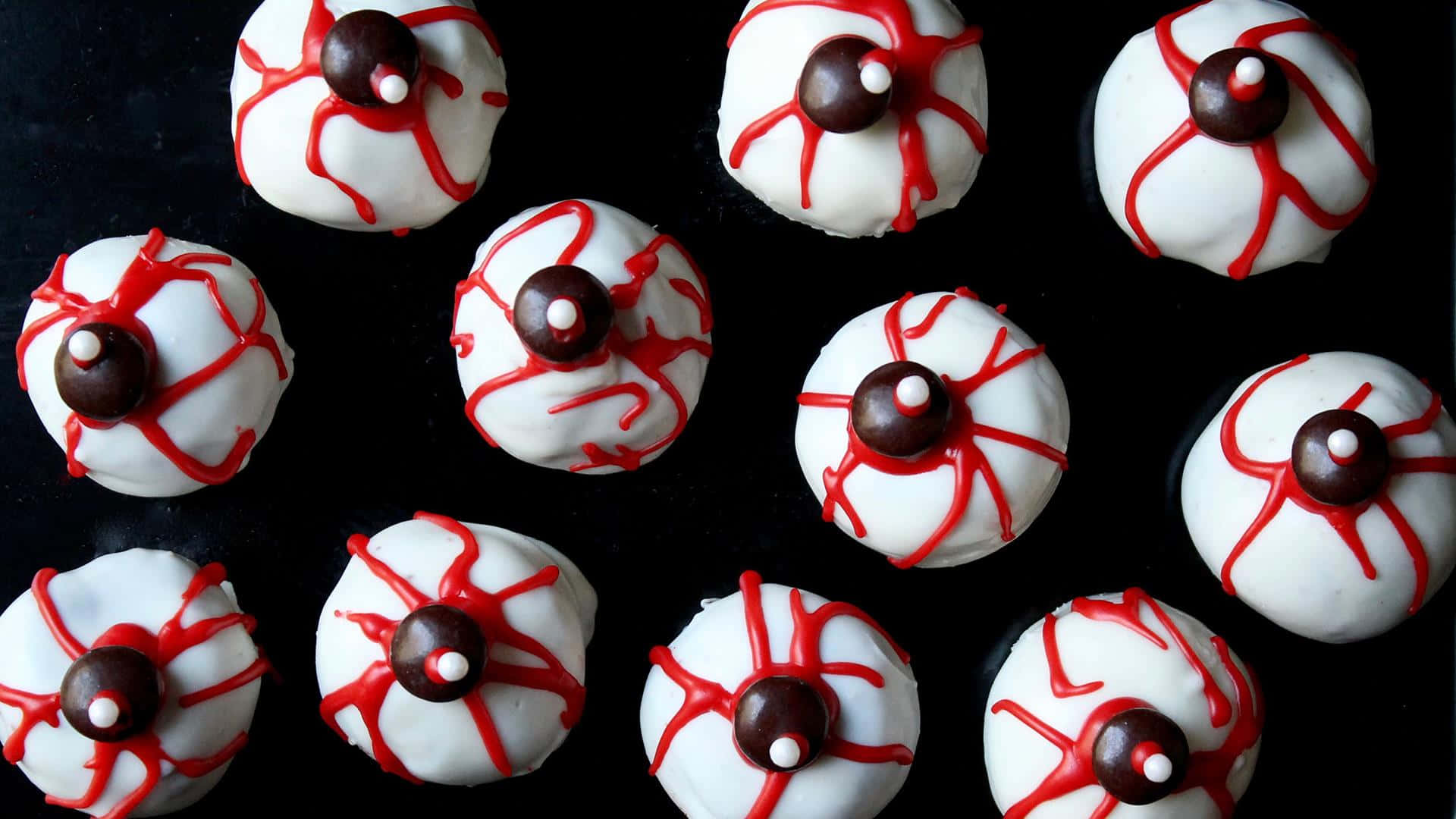 Celebrate Halloween With Delicious Cupcakes Wallpaper