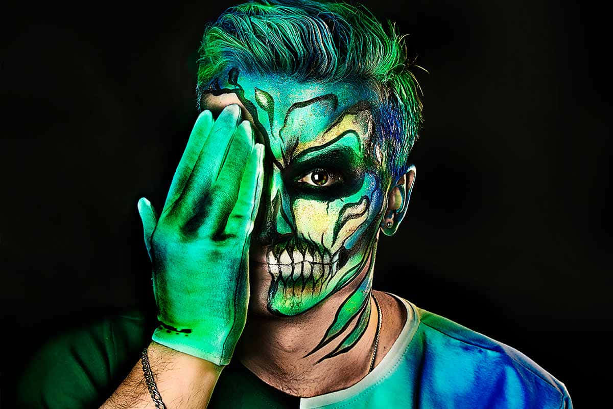 Get into the Halloween spirit with creative face painting! Wallpaper