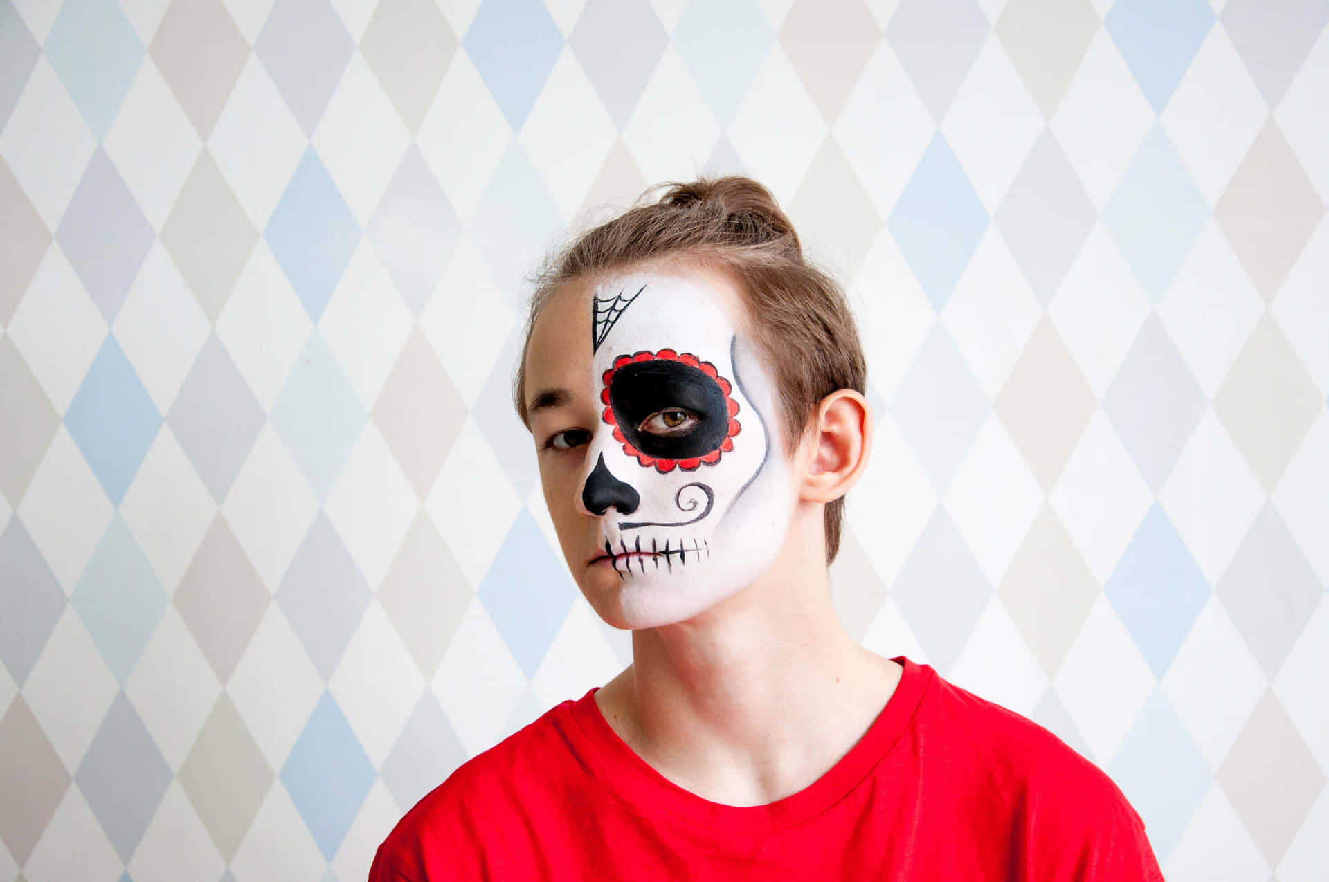 Get creative with creepy and colorful Halloween face paint. Wallpaper