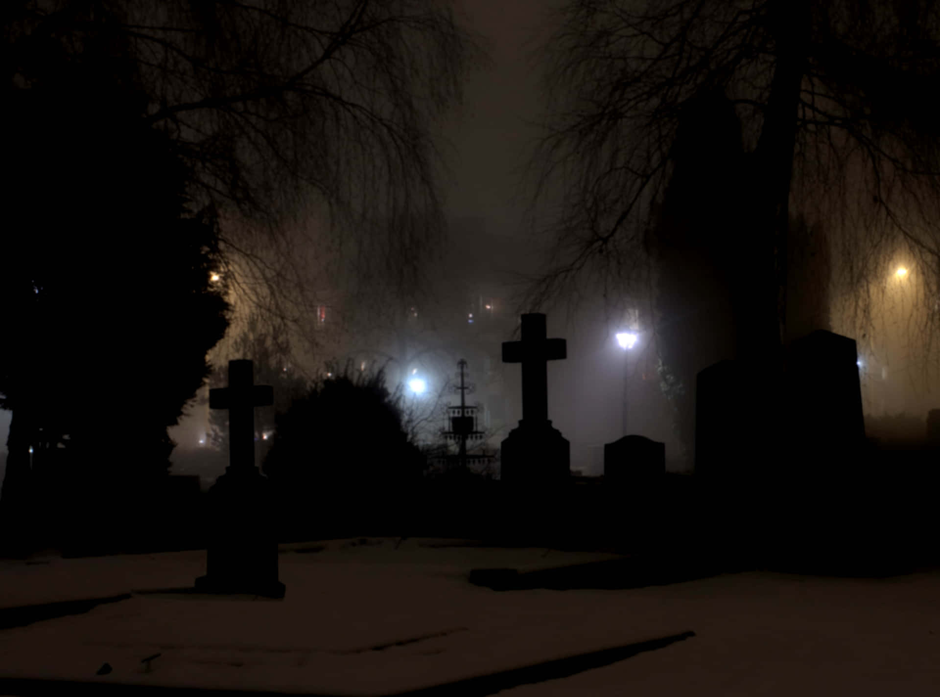 Spooky Halloween night in a graveyard. Wallpaper