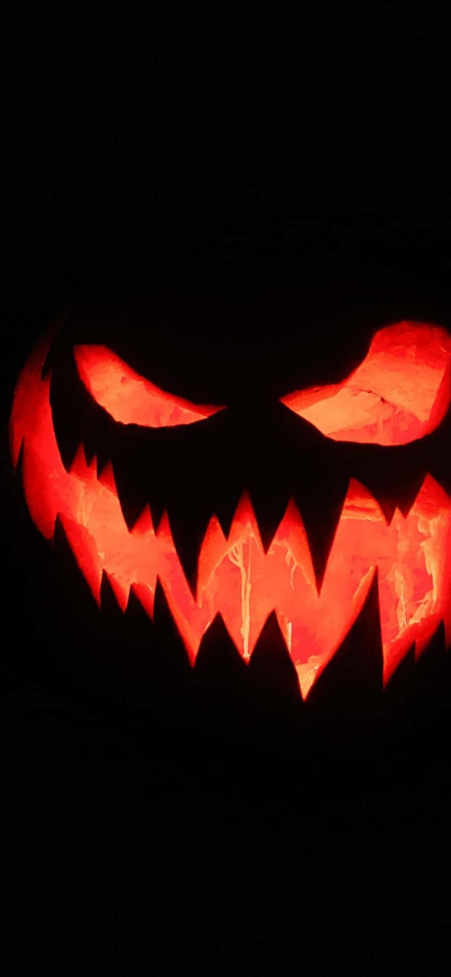 Geupp Din Enhet En Skrämmande Halloween-känsla Med En Läskig Iphone-bakgrundsbild.