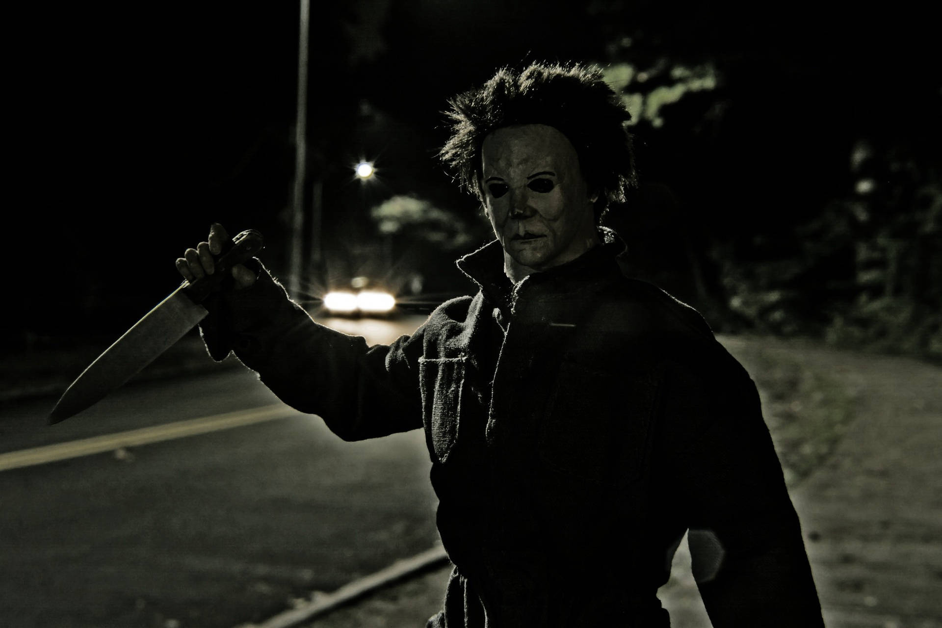Halloween Kills Michael On The Street Background