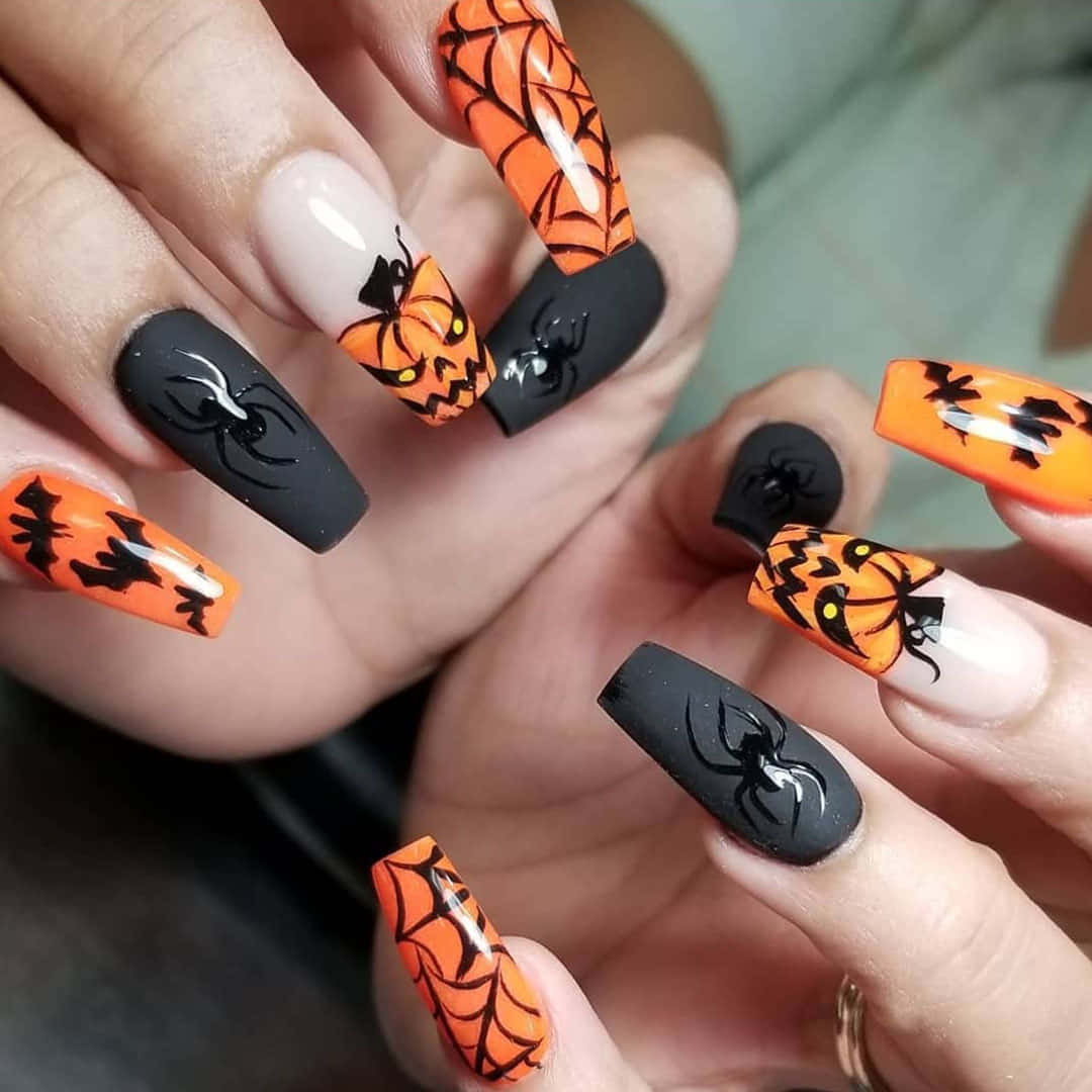 Unleash Your Inner Witch with These Spooky Halloween Nail Art Designs! Wallpaper