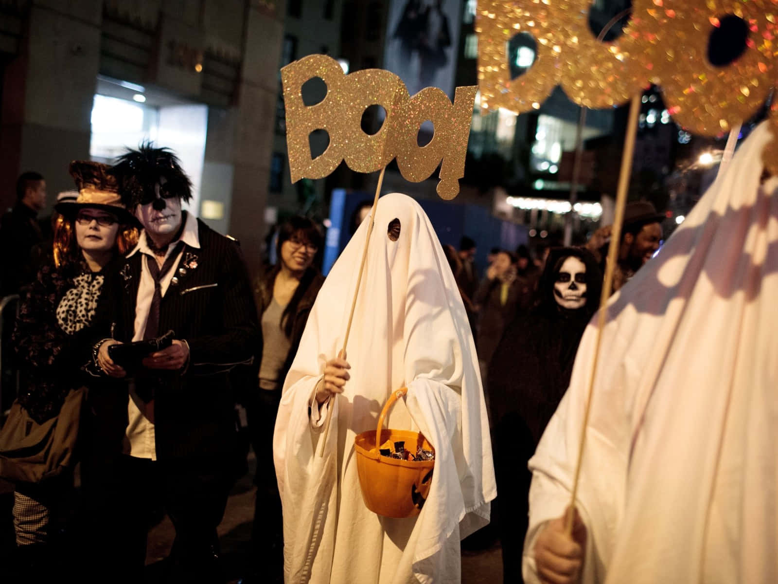 Kids show off their best costumes at the annual Halloween Parades. Wallpaper