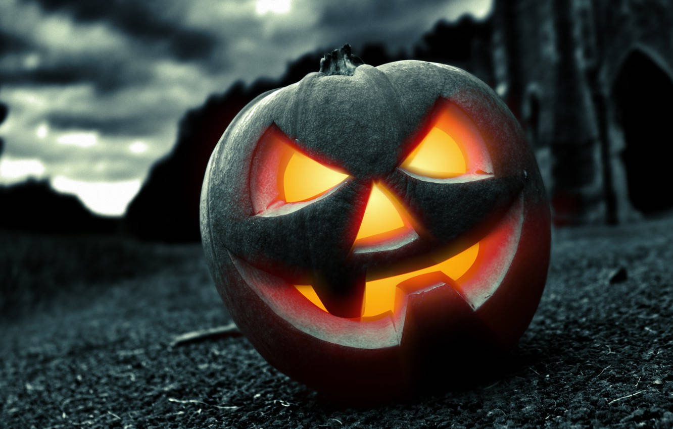 "Get Into The Halloween Spirit With This Spooky Pumpkin" Wallpaper