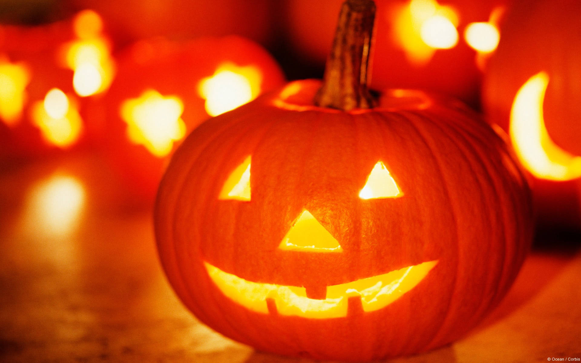 halloween pumpkins with glowing eyes Wallpaper