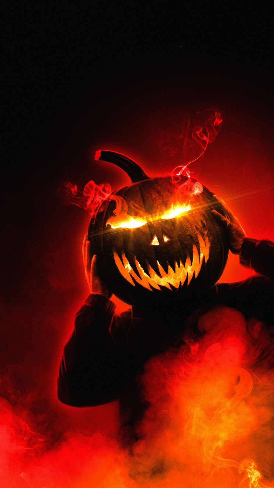 En Halloween Jack-o'-lantern belyst af Månens glød. Wallpaper