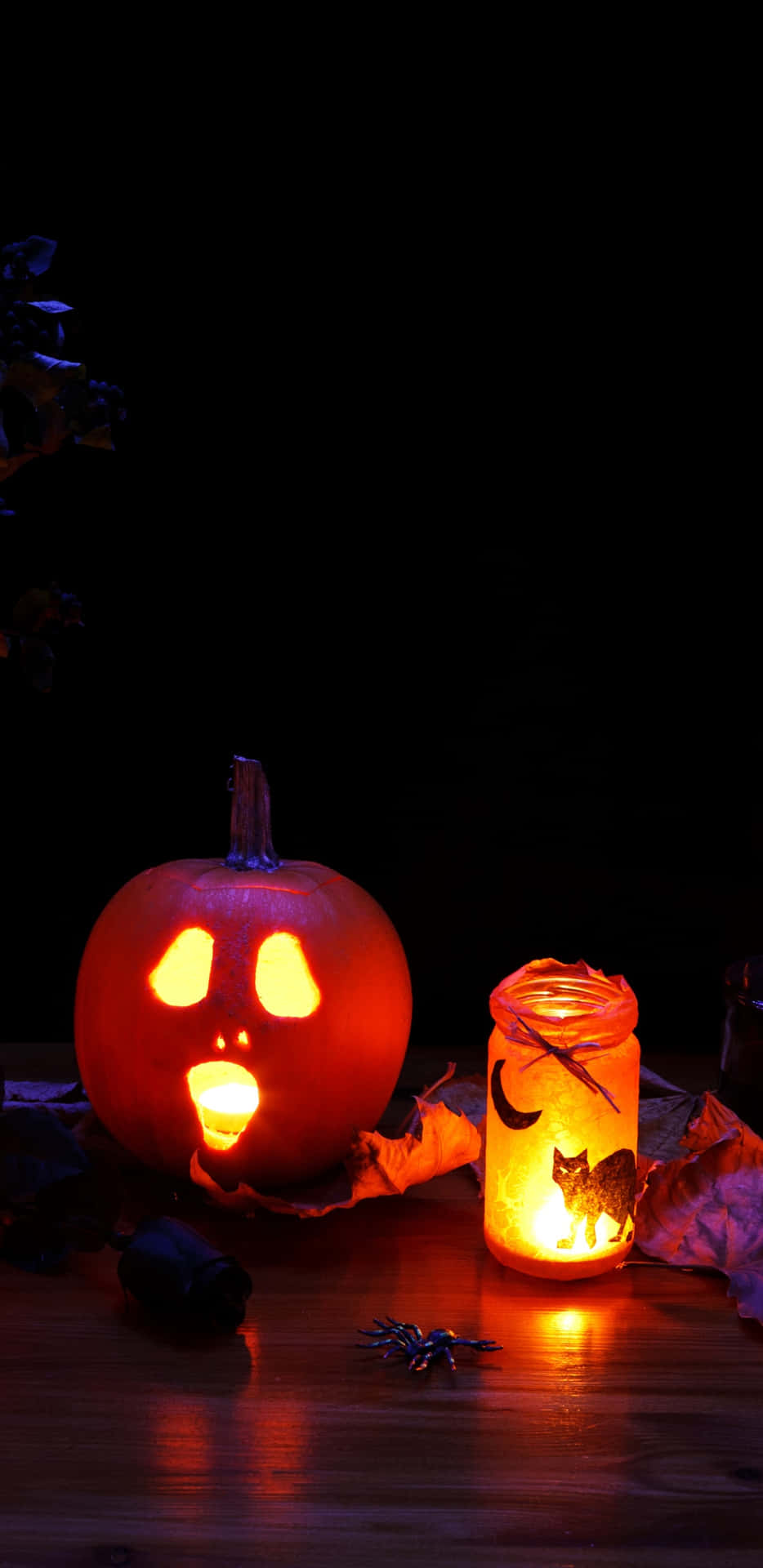 Halloween Pumpkinand Candle Glow Wallpaper
