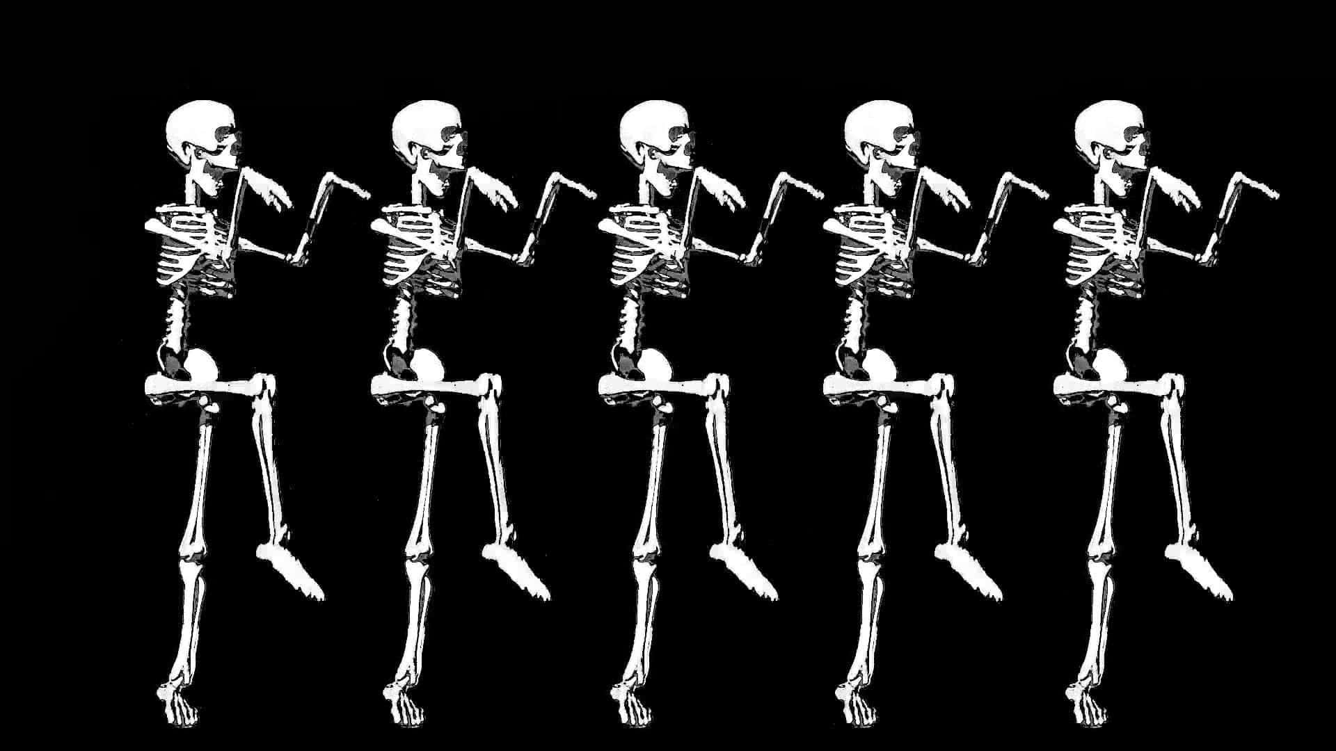Spooky Halloween Skeleton Grinning in the Dark Wallpaper