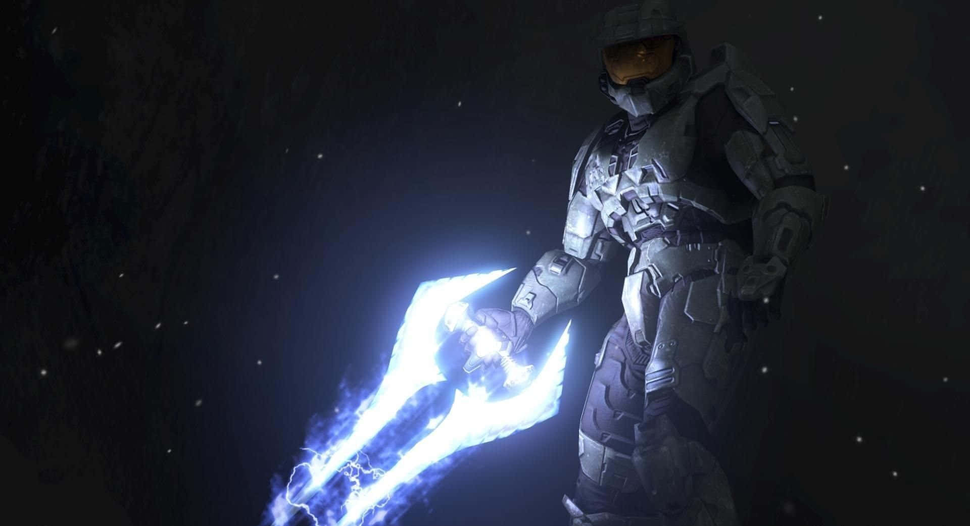 Unapoderosa Espada De Halo De Energía Azul Iluminada De Manera Brillante Sobre Un Fondo Oscuro. Fondo de pantalla
