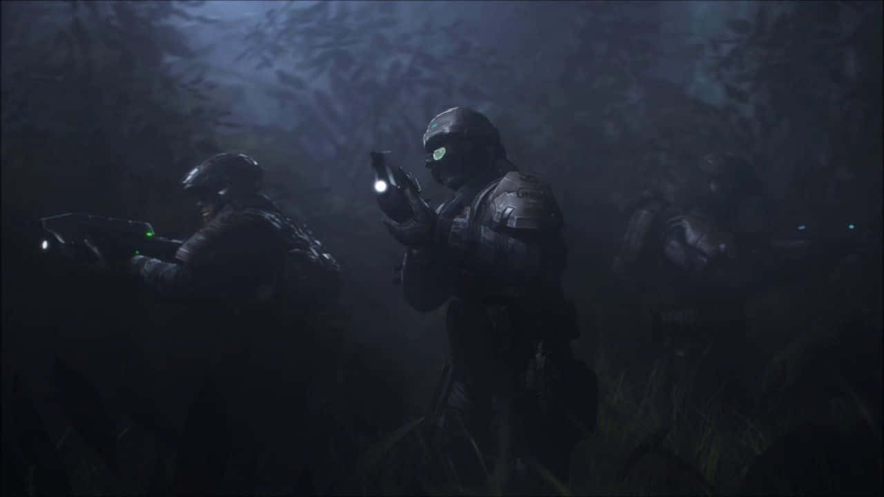 UNSC soldiers in action during an epic Halo battle Wallpaper