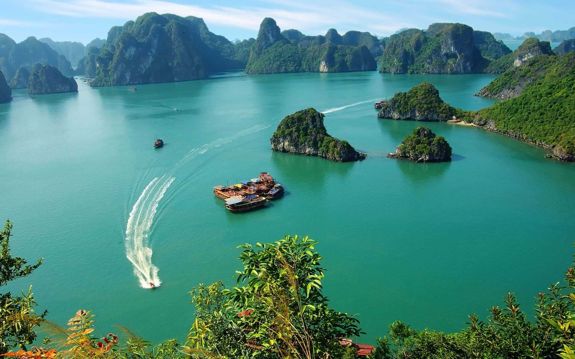 Halong Bay With A Fast Speed Boat Wallpaper