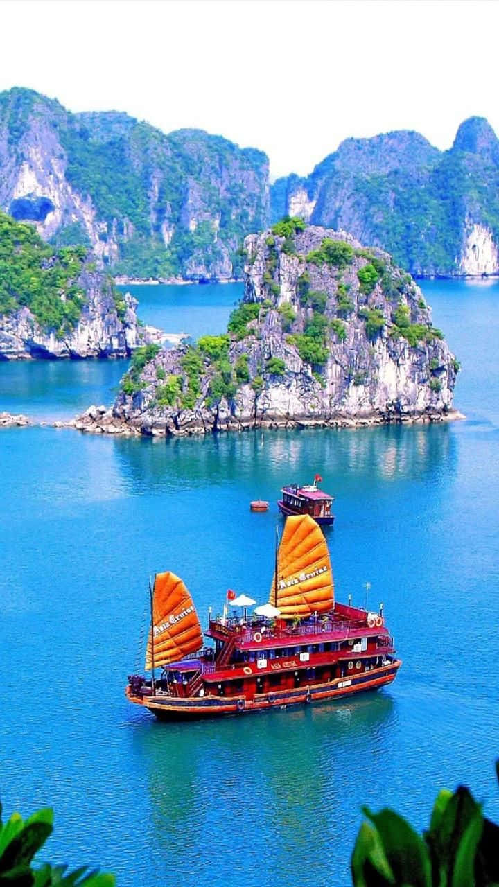 Halong Bay With Red Cruise Ship Wallpaper
