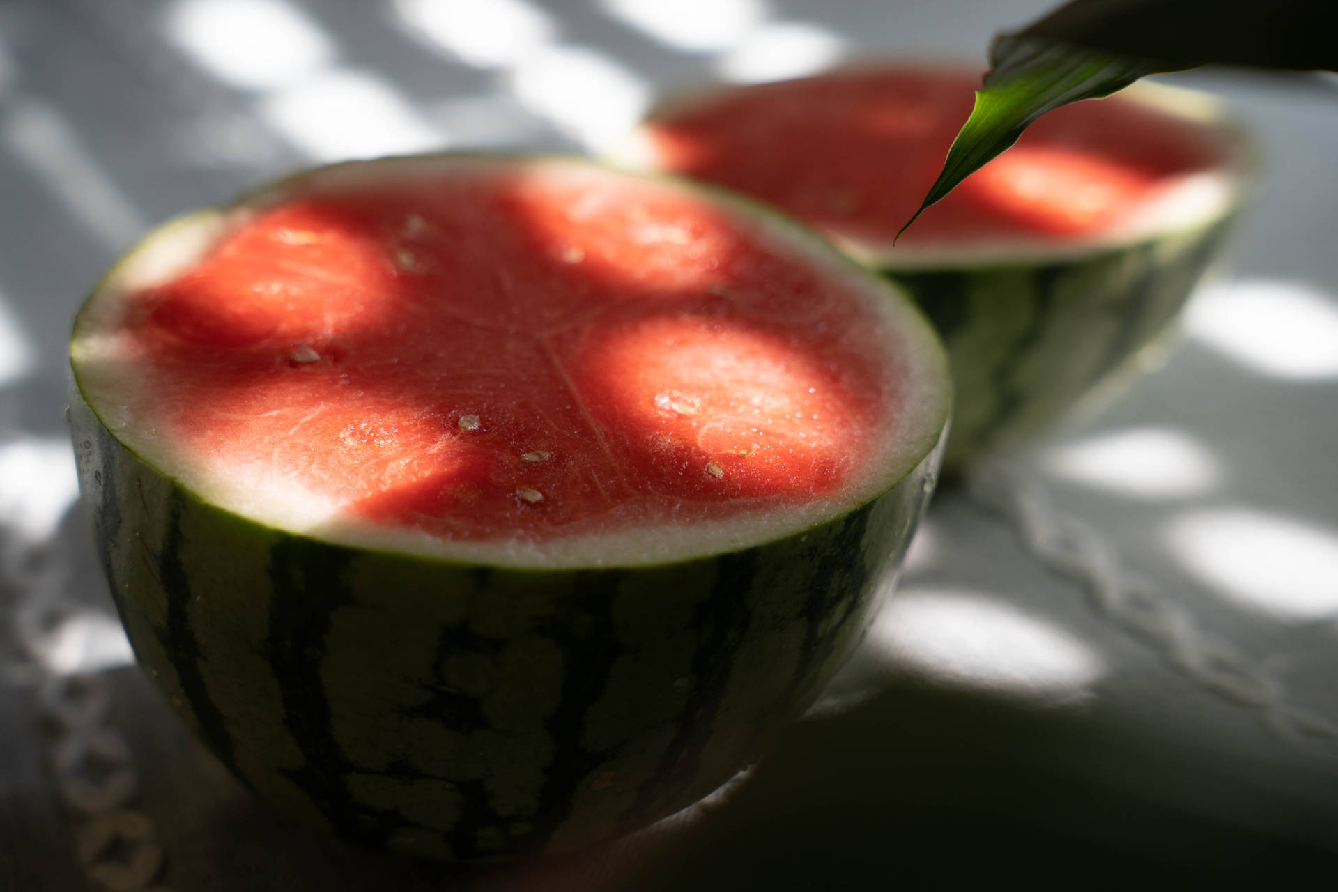 Halved Watermelon Under The Sun Wallpaper