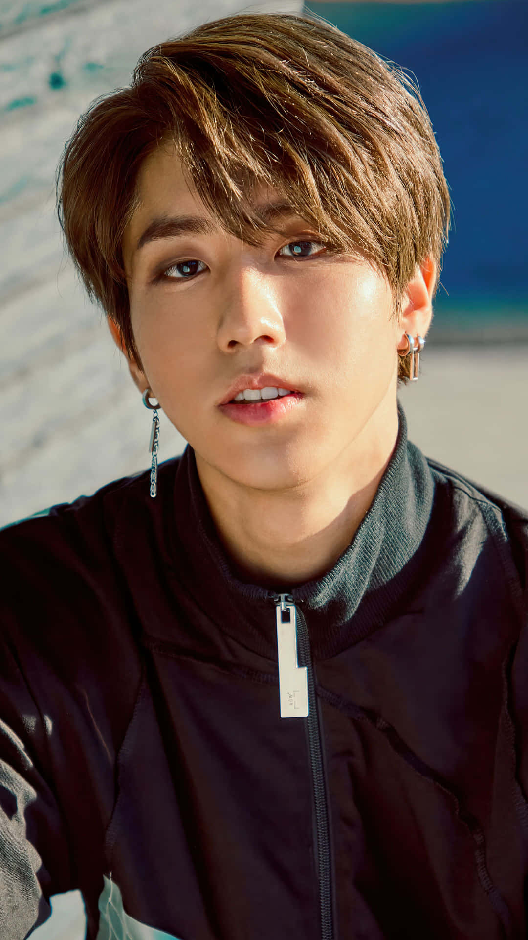 Han Jisung Sunlit Portrait Wallpaper