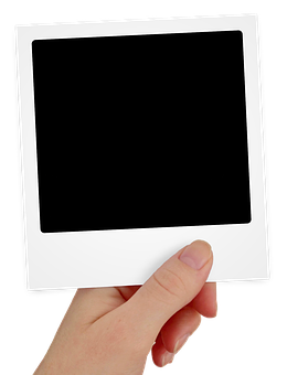 Hand Holding Blank Polaroid Frame PNG
