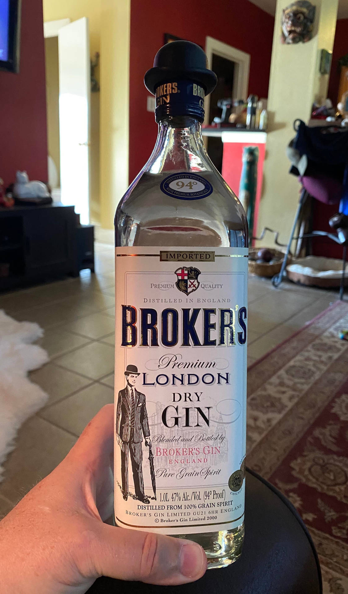 Hand Holding Brokers Gin Wallpaper