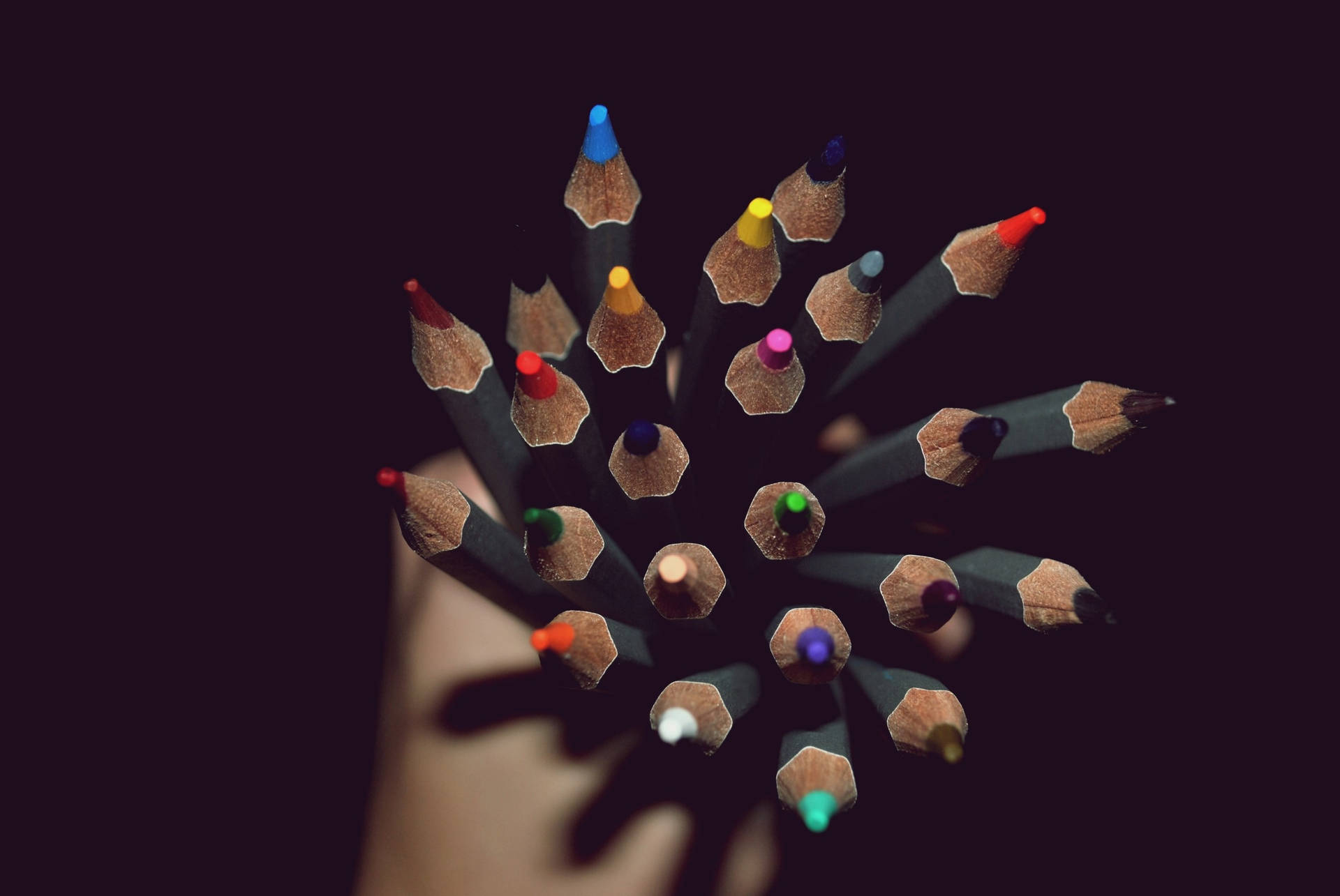 Hand Holding Color Pencils Wallpaper