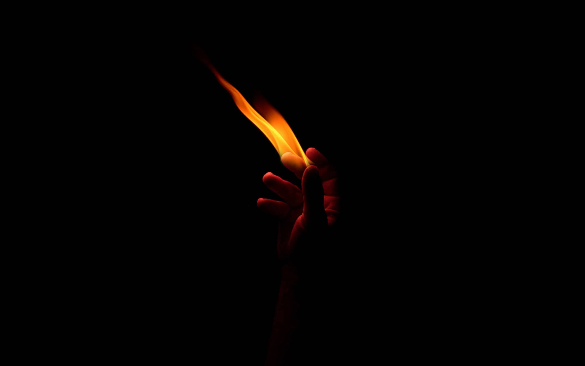 Hand Holding Fire Background Wallpaper