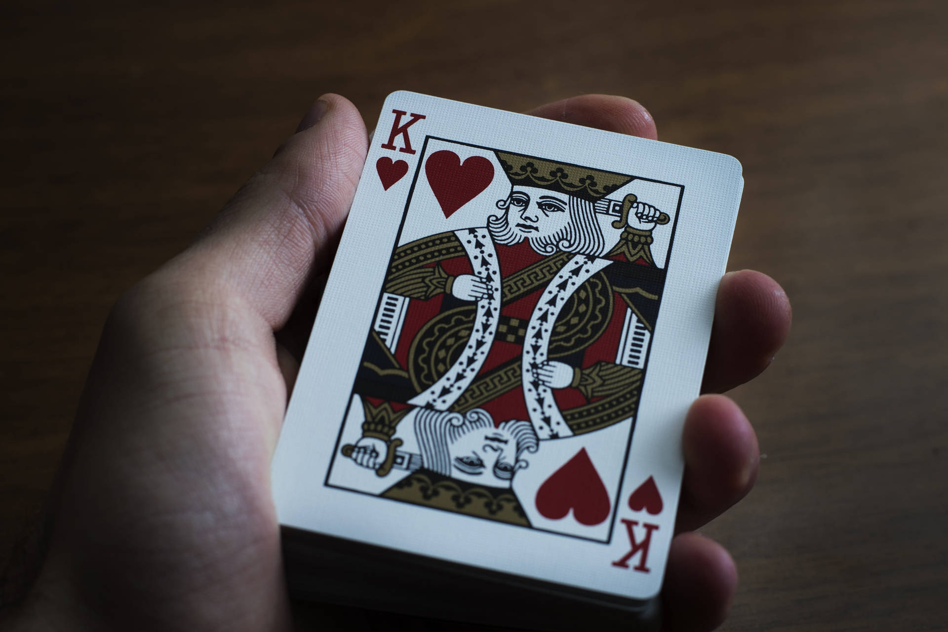 Download Hand King Of Hearts Playing Cards Wallpaper 