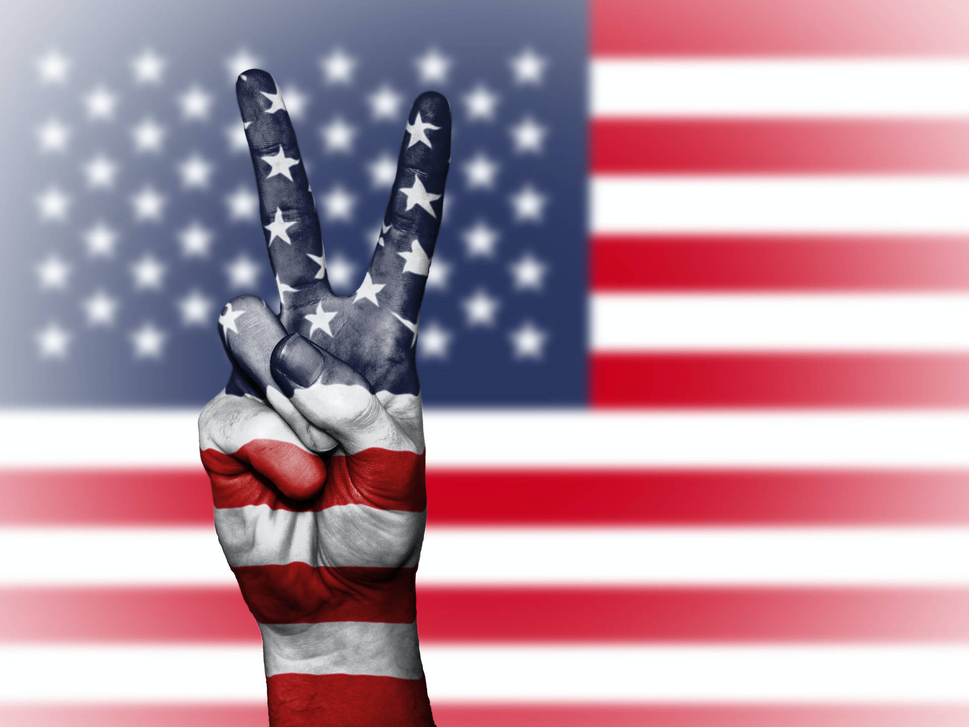Símbolode Paz En Mano Con La Bandera De Estados Unidos Fondo de pantalla