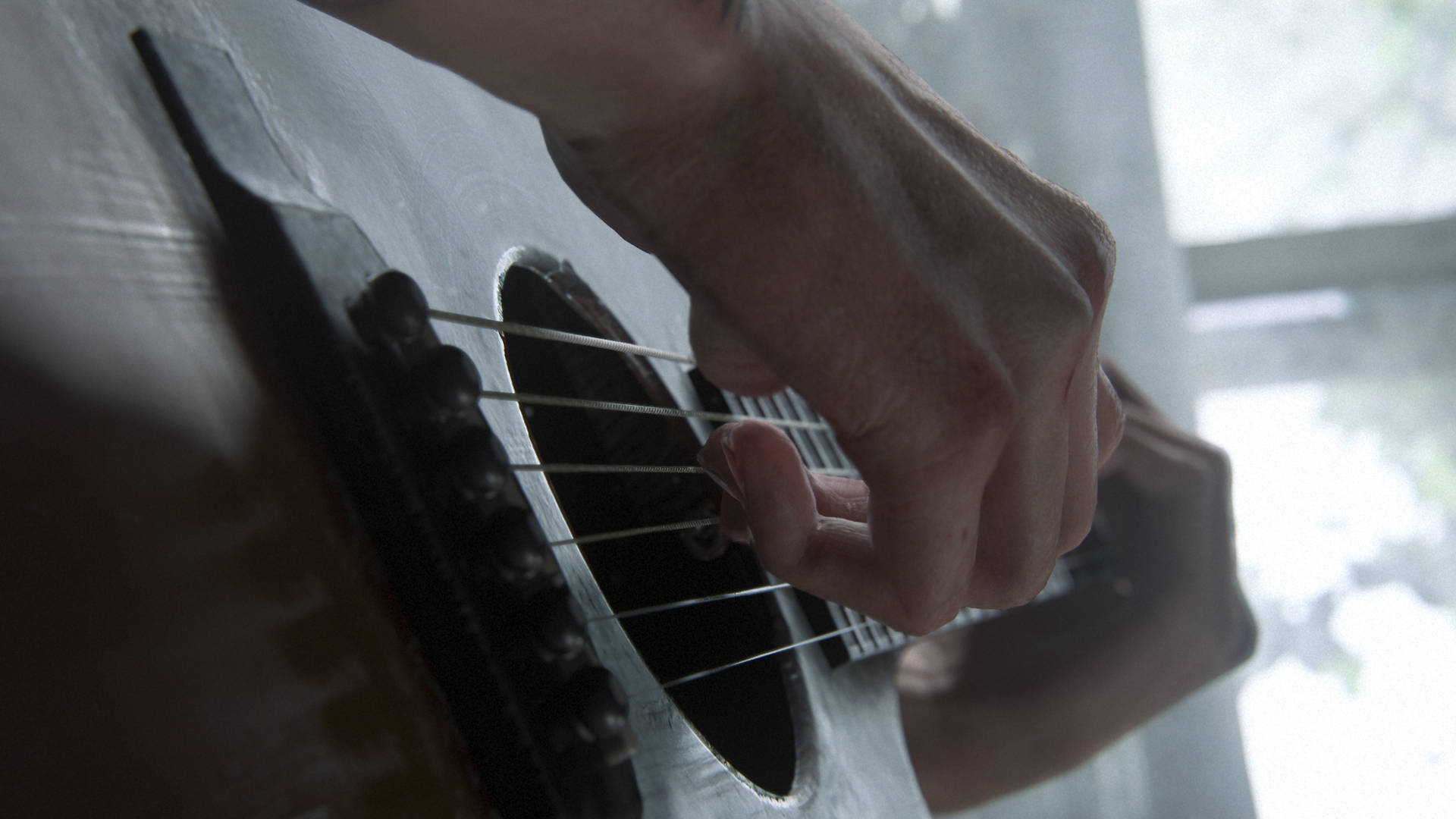 Hand Strumming Guitar The Last Of Us 4K Wallpaper