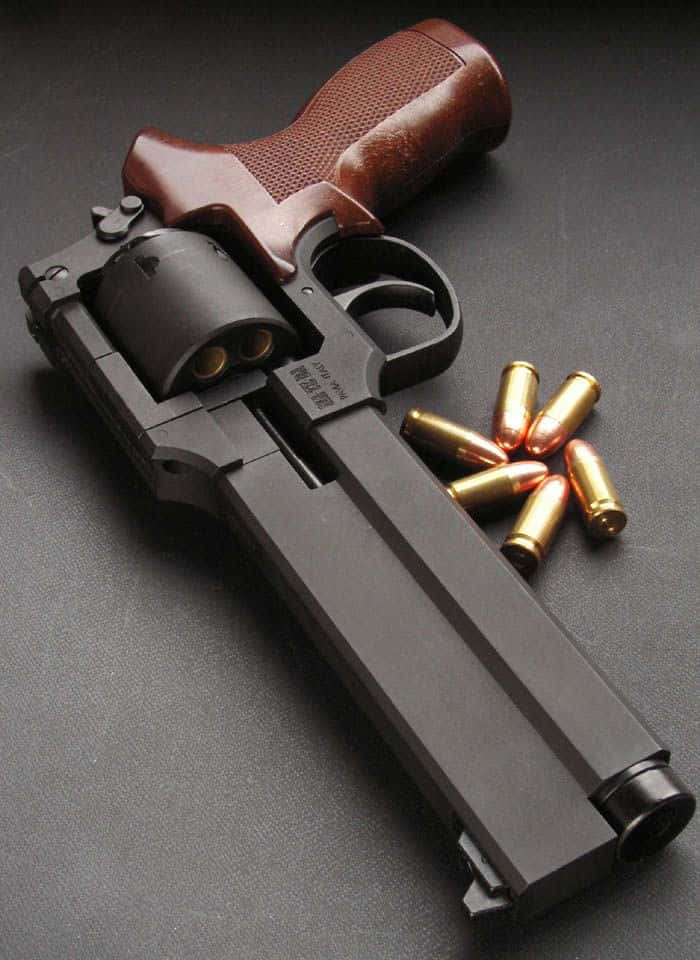 Matte Revolver Handgun With Bullets Picture