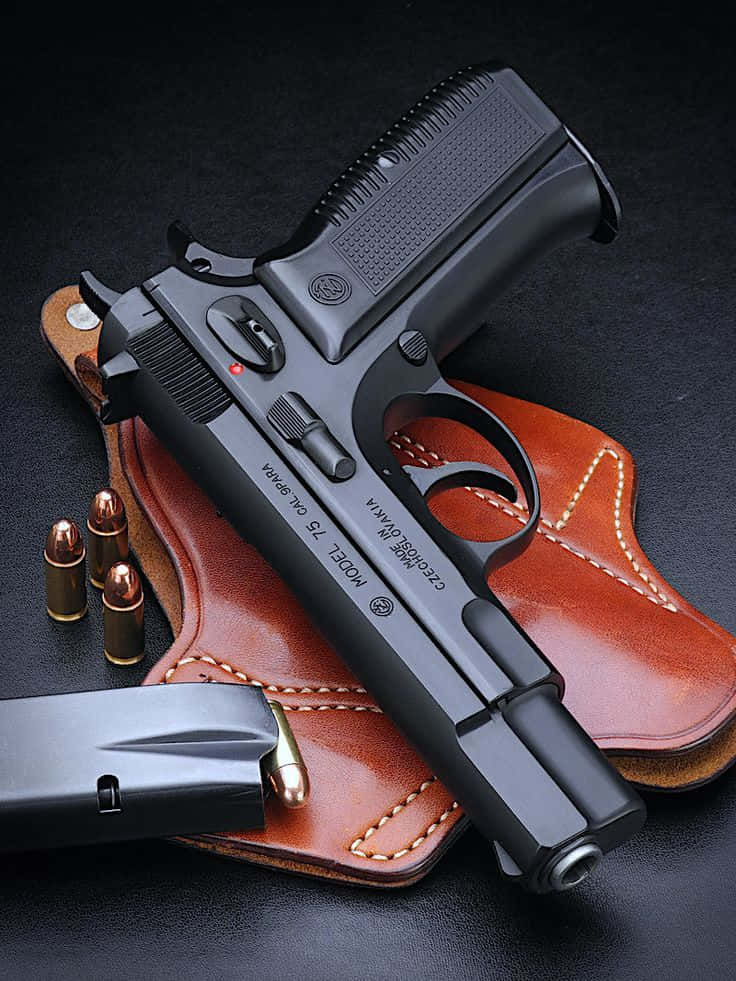 Pistol Handgun With Bullet And Leather Picture