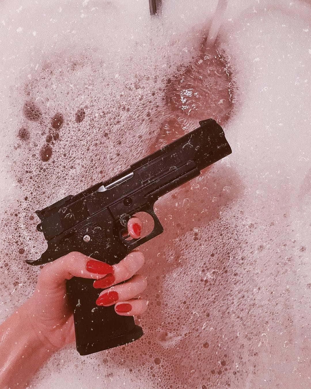 Handgunin Bubble Bath Wallpaper