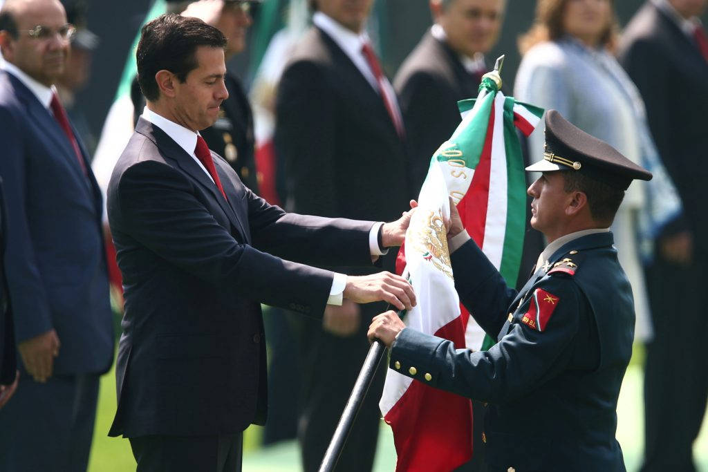 Handing Over The Mexico Flag Wallpaper