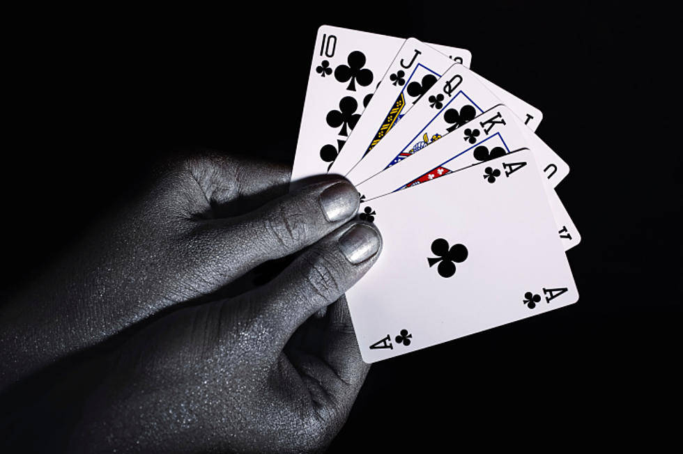 Hands Holding Euchre Playing Cards Wallpaper
