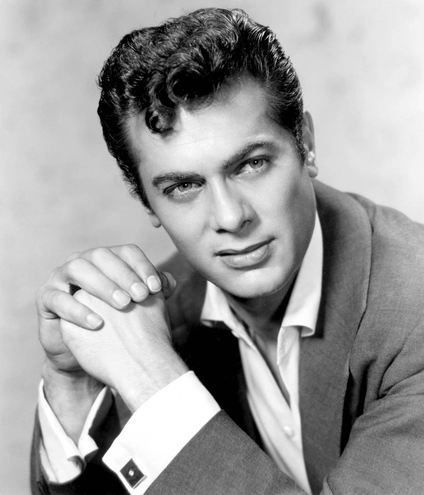 Legendary Actor Tony Curtis with Hands Together Wallpaper