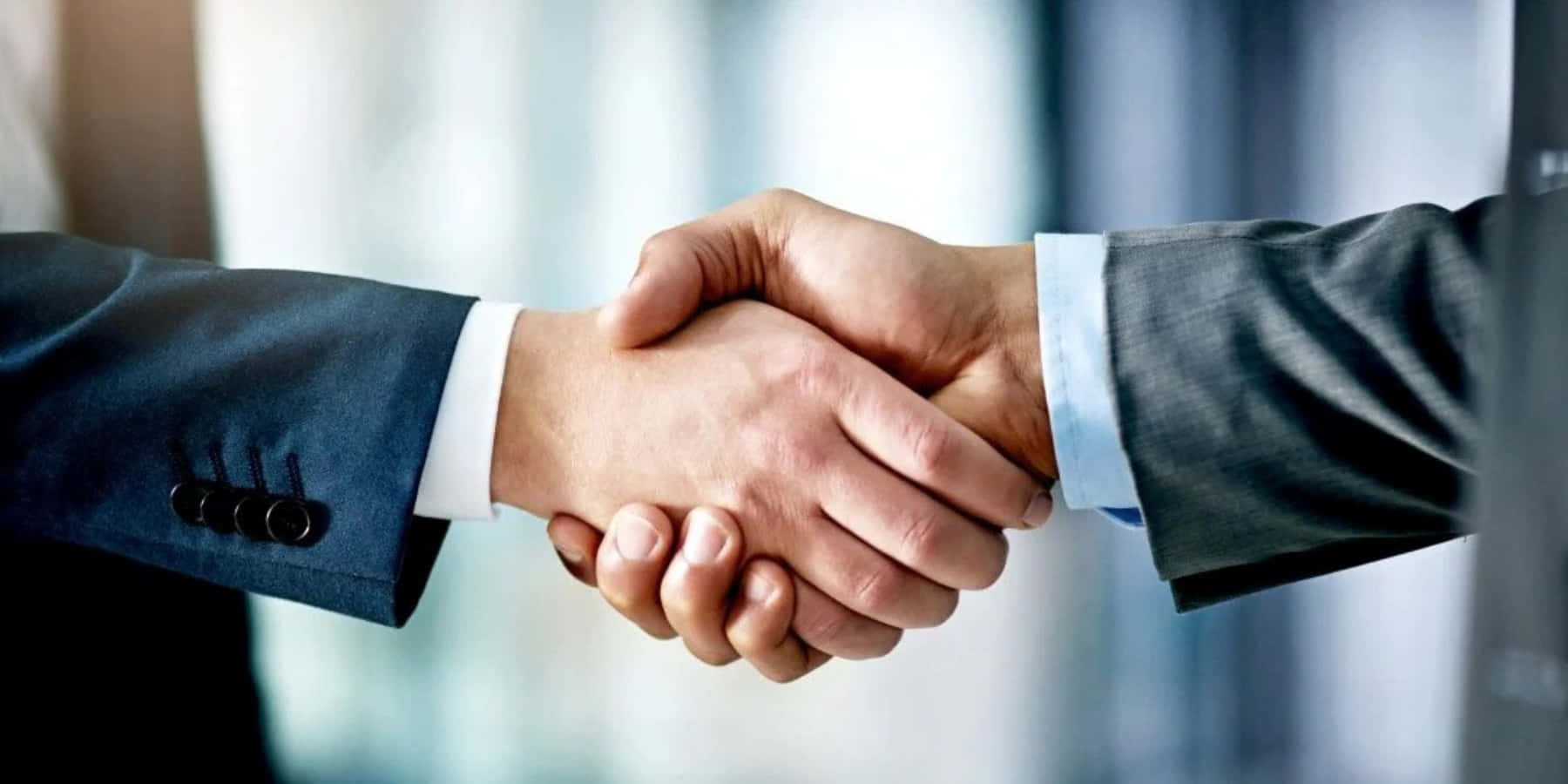 Two Businessmen Handshake Desktop Picture