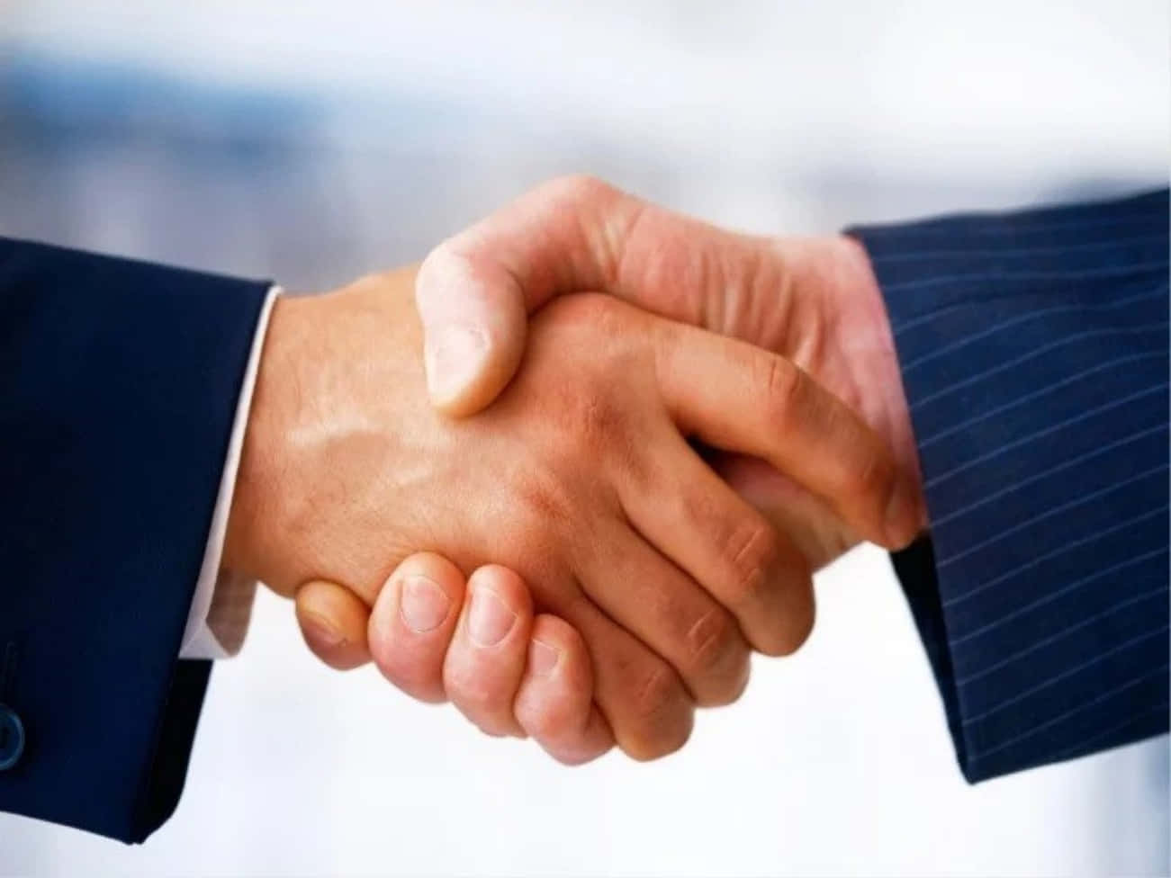 Close Up Businessmen Handshake Picture