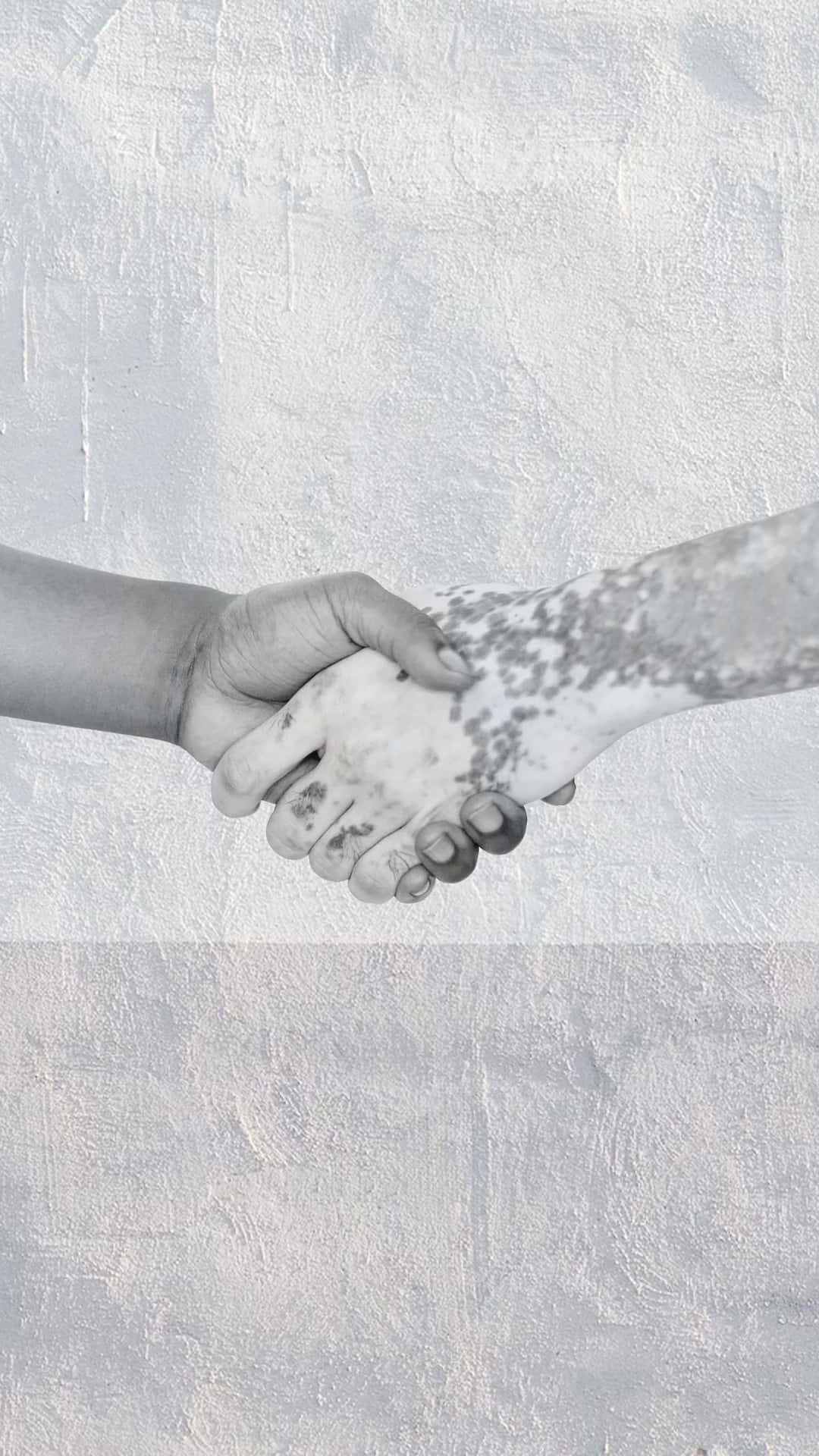 Handskakningmed Vitiligo. Wallpaper