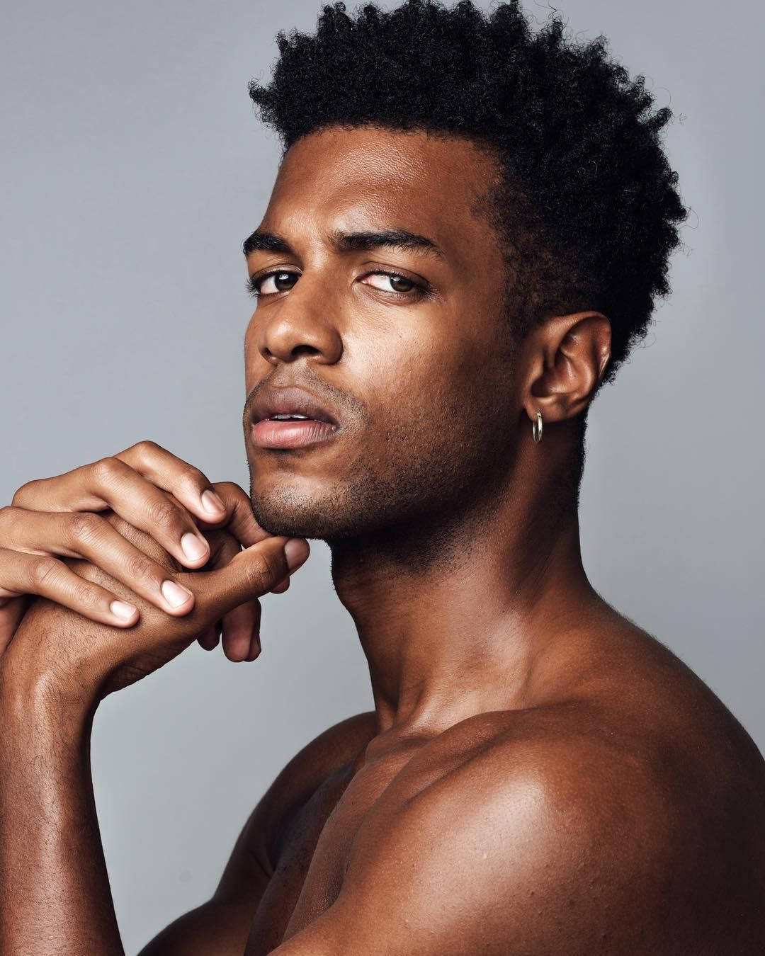 Handsome Black Man Frowning Model Wallpaper