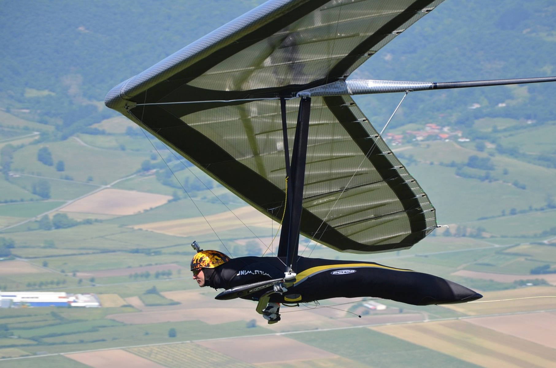 Aerial Reflection of Freedom - Hang Gliding Over Rio's Landscape Wallpaper