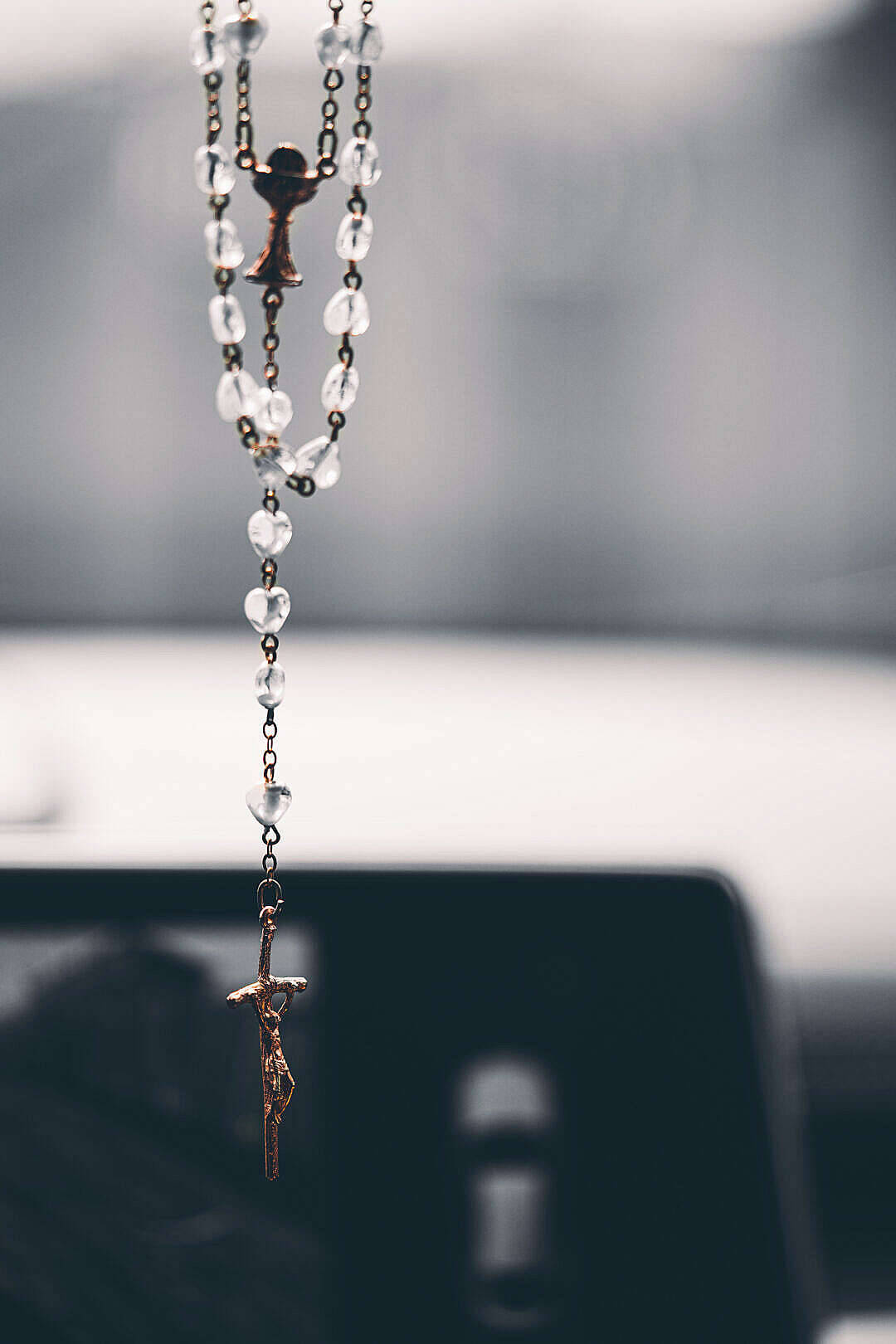 Hanging Rosary With Jesus On Cross Wallpaper