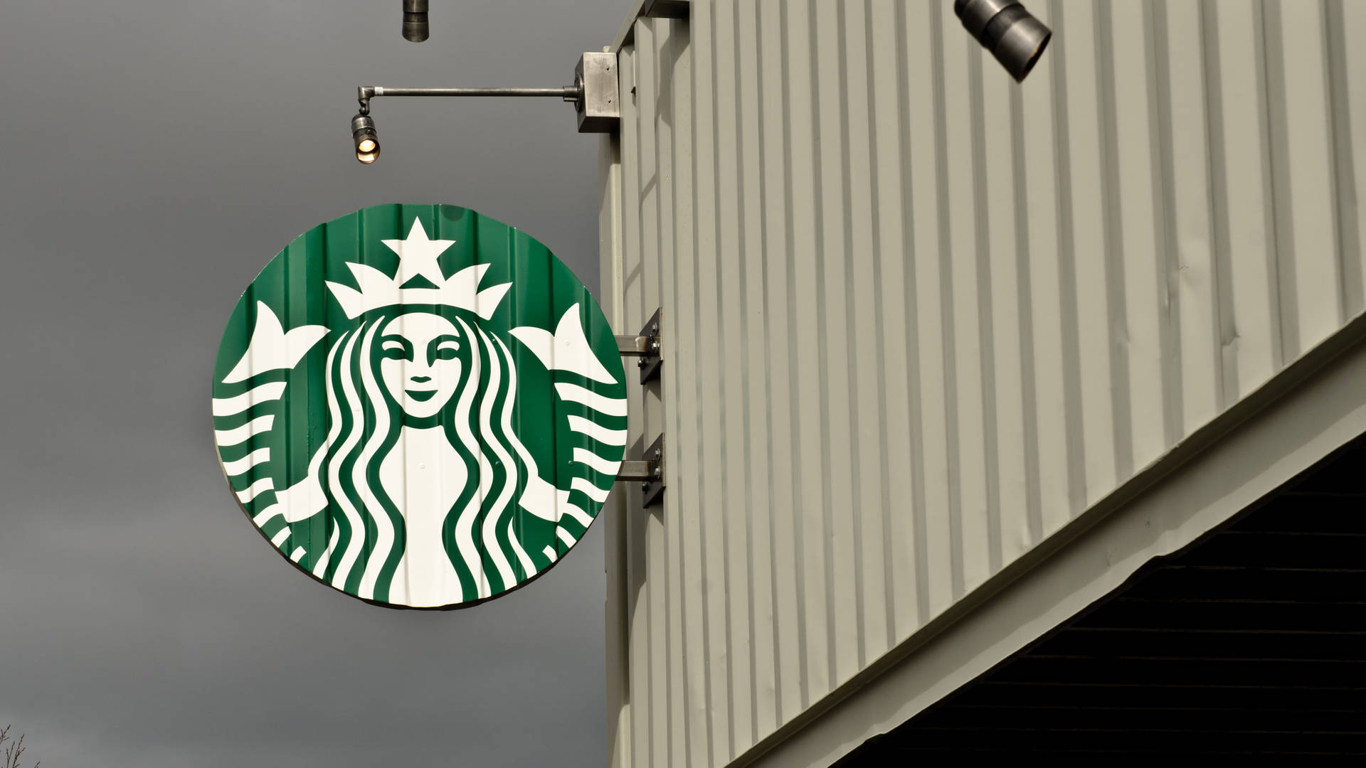 Hanging Starbucks Logo Display Wallpaper