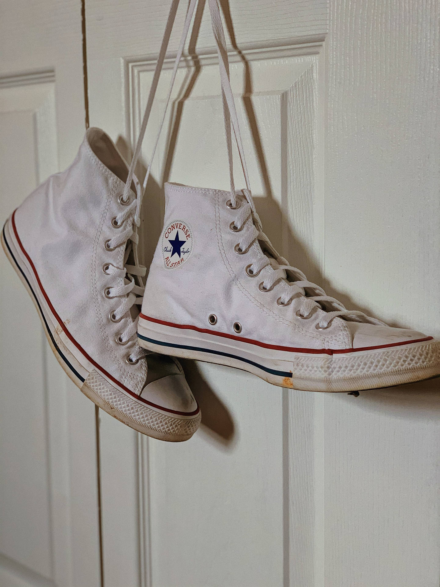 Hanging White Converse Background