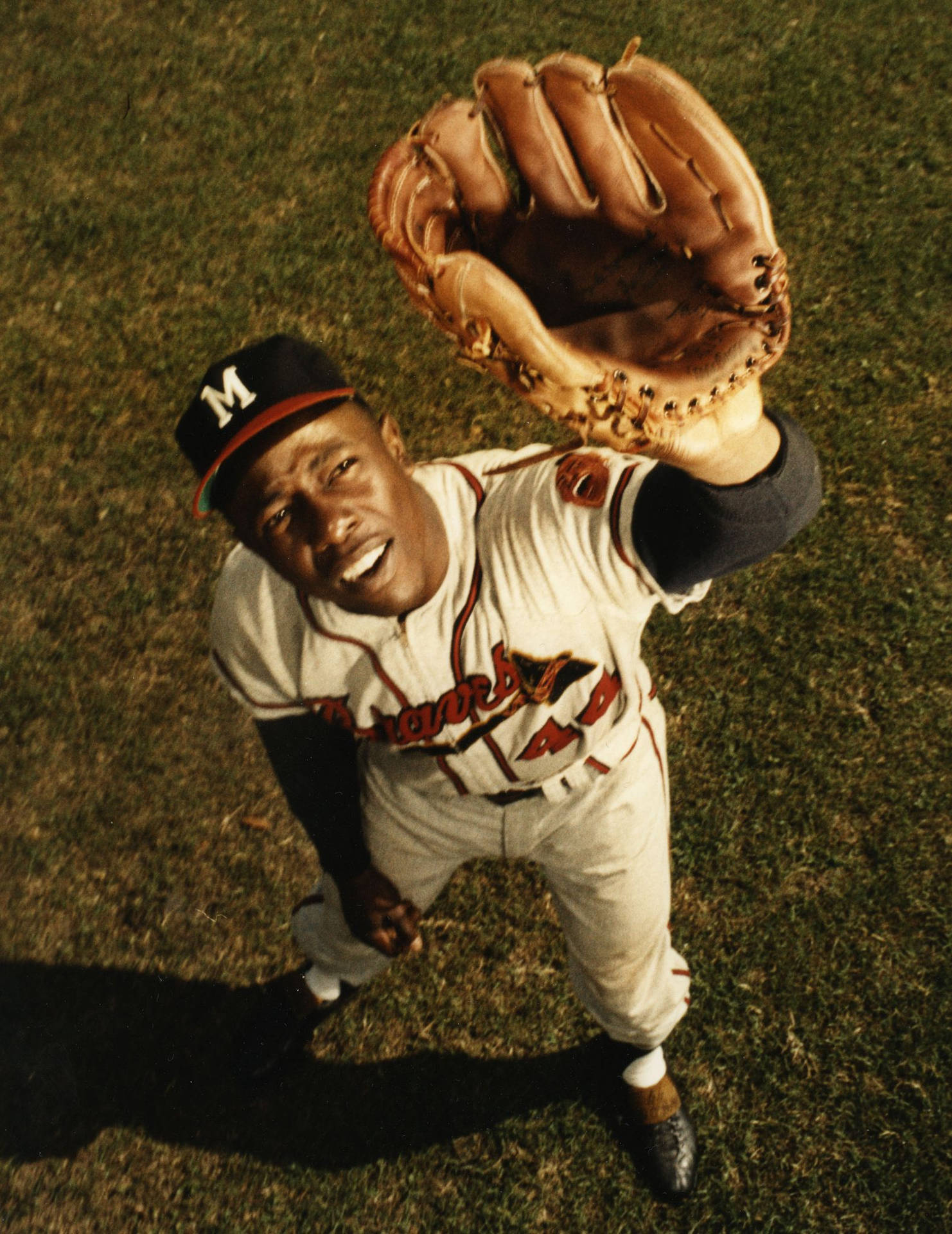 Hank Aaron Covering Eyes With Glove Wallpaper