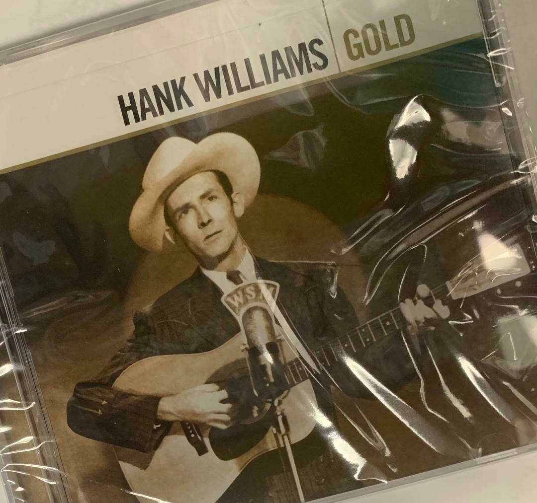 Hank Williams Gold CD er produceret med et flamme mønster. Wallpaper