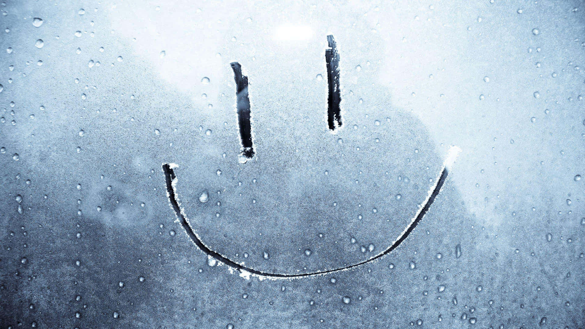 A Smiling Face Drawn On A Window