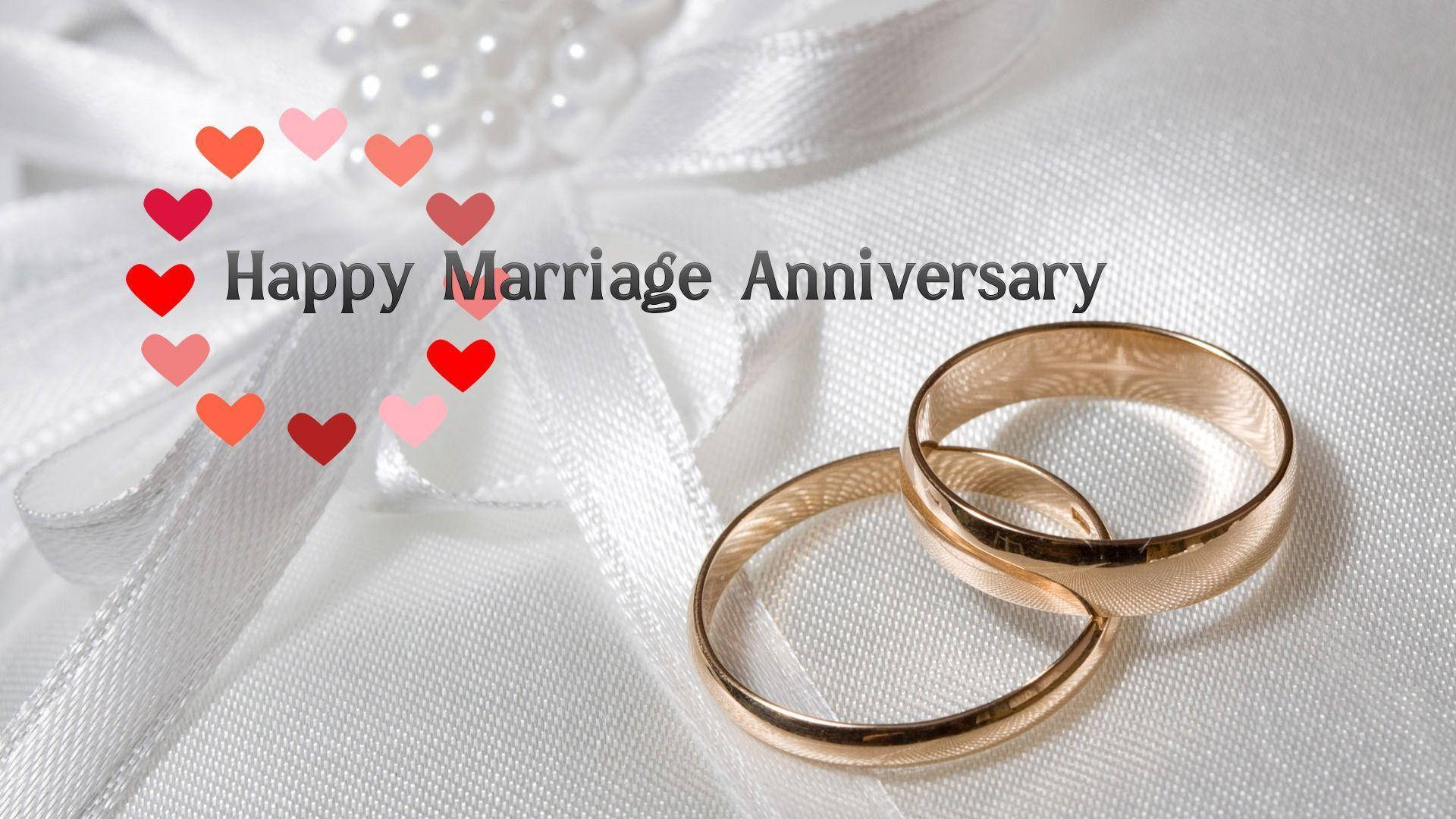 Download Happy Anniversary Gold Wedding Rings Wallpaper 
