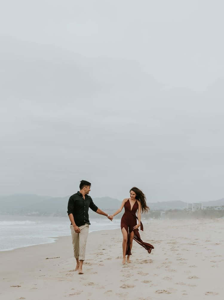 Happy Couple Beach Date Picture