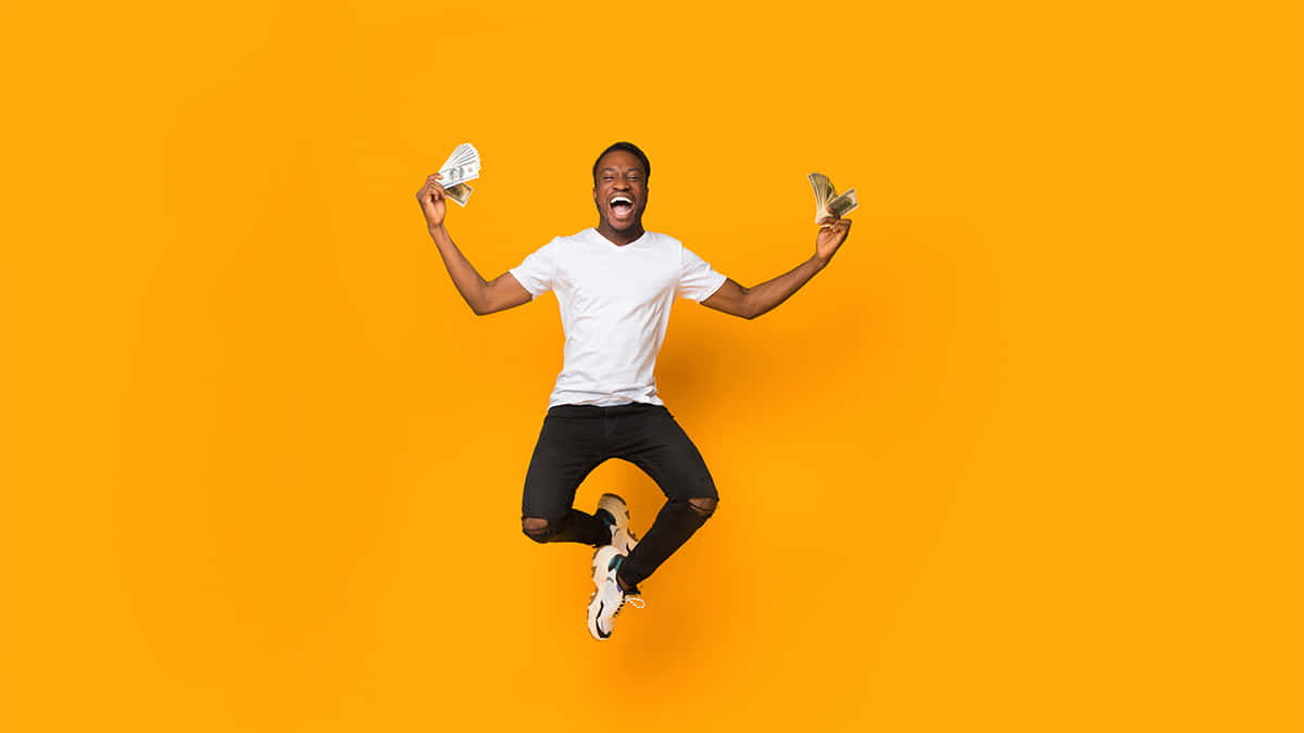 Happy Man Jumping On Yellow Picture