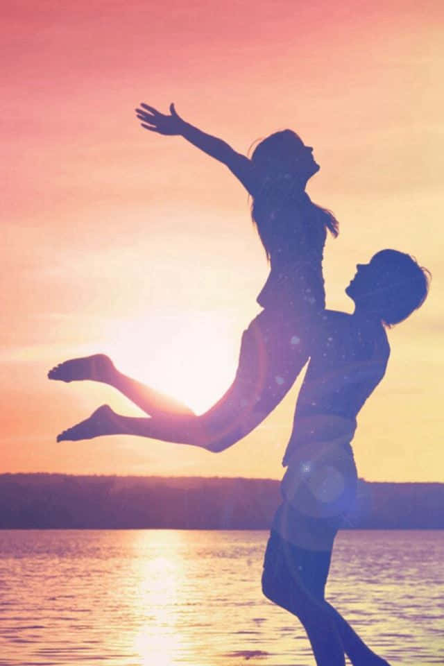Happy Sunset Couple Wallpaper